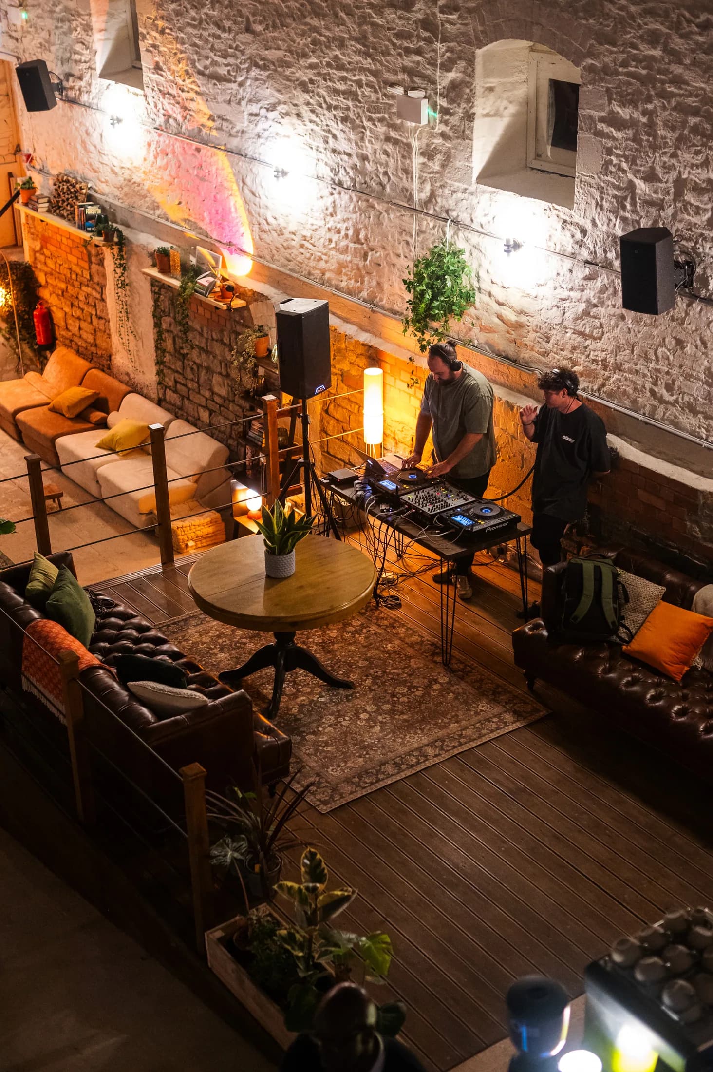 DJ booth overlooking the HOTBOX social lounge