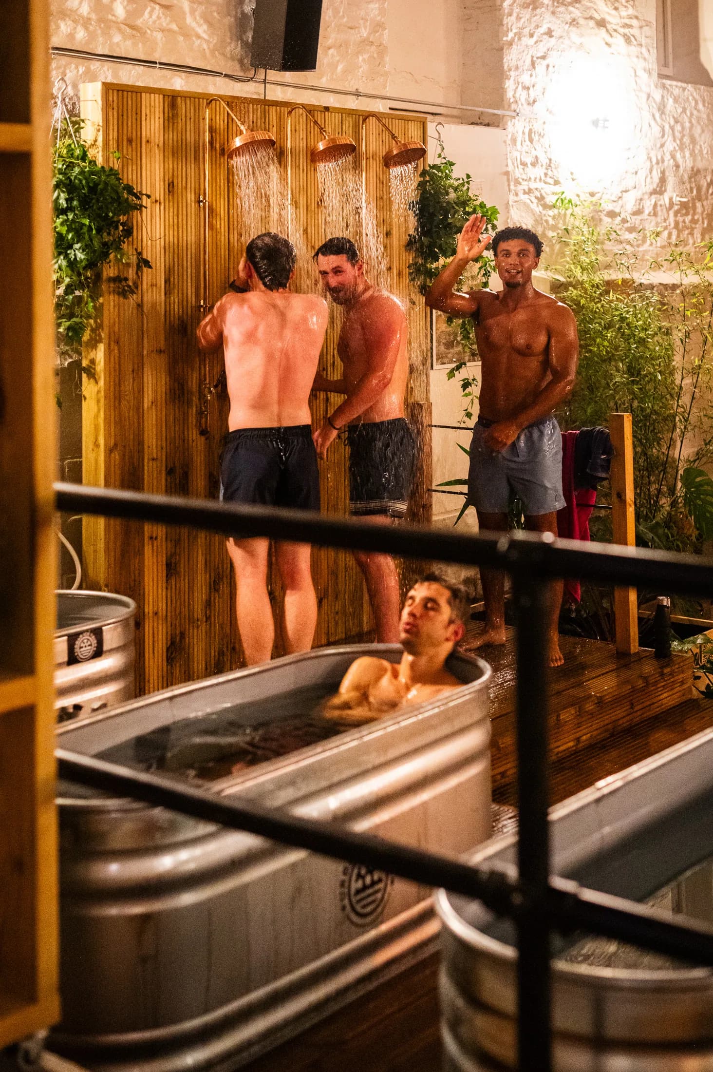 Friends talking beside the plunge pools